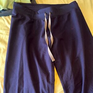 Small figs navy blue. Worn maybe 3 times. See spot on left front of pants